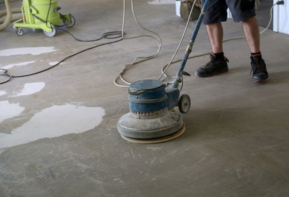 man polishing floor